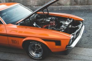 To fully prepare your car for a cross country move, the engine - such as the v8 on this Ford Mustang, must be in perfect order.