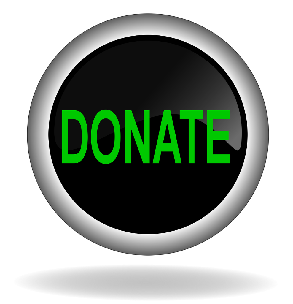 The word DONATE written in green letters in a black circle