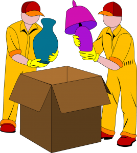Movers putting items in a box.