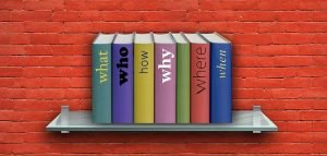 Books with questions pronouns on a shelf
