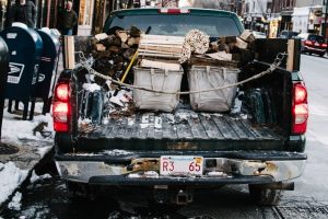 Boxes and bags in the back of a pickup truck