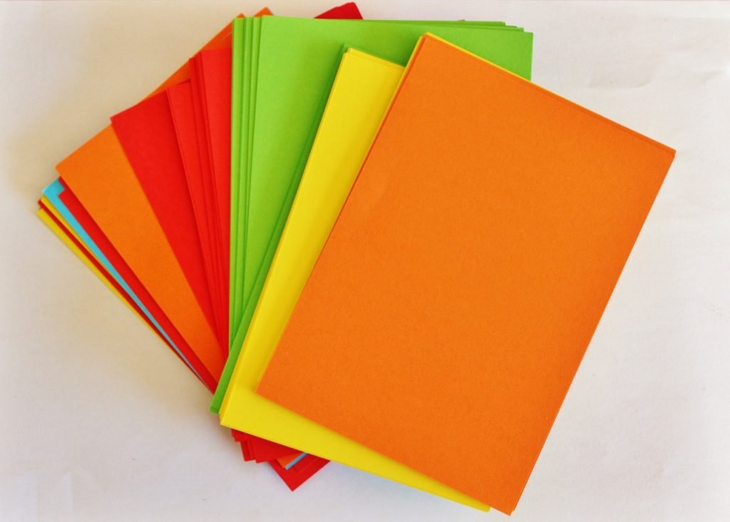 Different colored papers - blue, green, yellow, orange and red