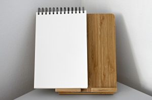 An empty notebook to write down the risks of moving your business.
