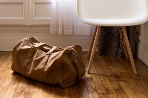 a travel bag on the floor