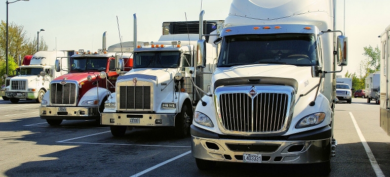 A cross country movers Nebraska truck fleet on a parking lot
