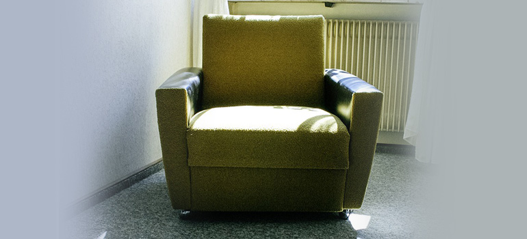 an old green armchair