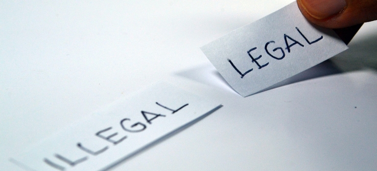 taking a piece of paper that says legal on it