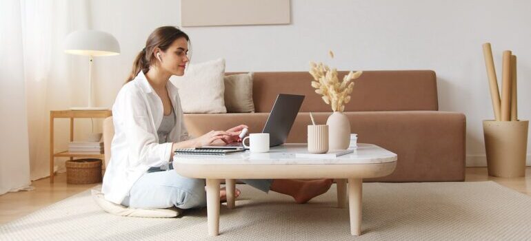 Relaxed woman using laptop