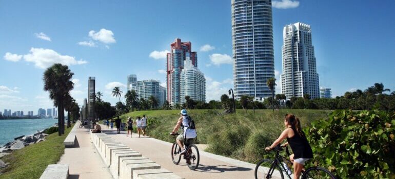 People riding bicycles on the track in Miami Beach.