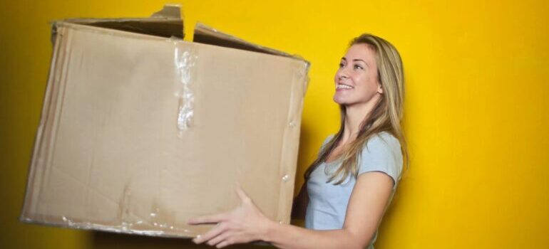 woman moving with the help of the best cross country movers Winston-Salem