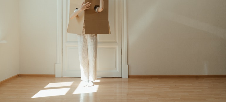 a person in a cardboard box