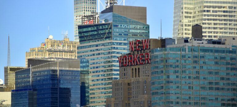 Buildings of NYC with letters NEW Yorker.