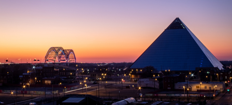 a panoramic view of the city of Memphis, with the Memphis Bridge and the Pro Bass Shop in the focus