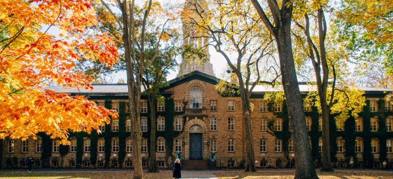 a picture of the Princeton University, one of the most popular US colleges for 2022, taken from the park in front of it