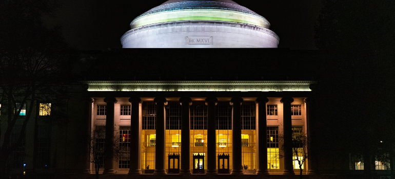 a picture of MIT University taken during the evening