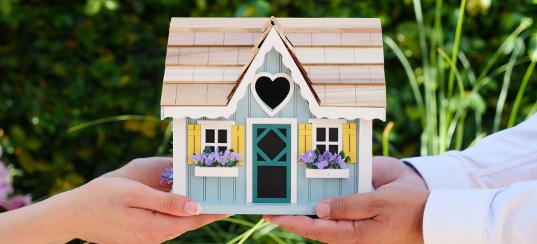 A model of a new house that is a symbol of the family