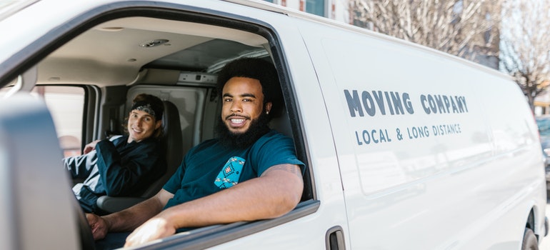 Moving from Cedar Rapids to Los Angeles - two men driving a moving van