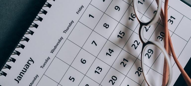 A calendar with eyeglasses on it