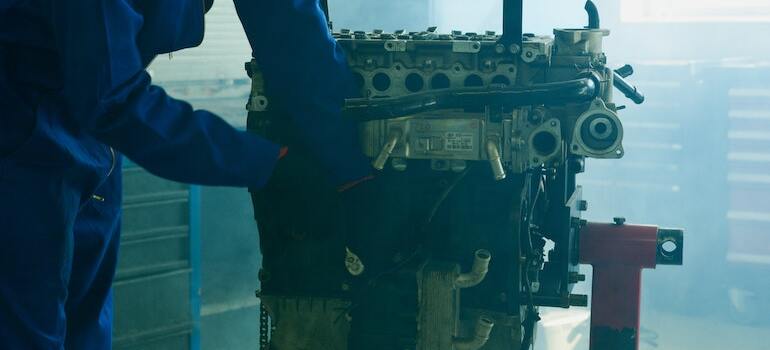 A mechanic checking the engine