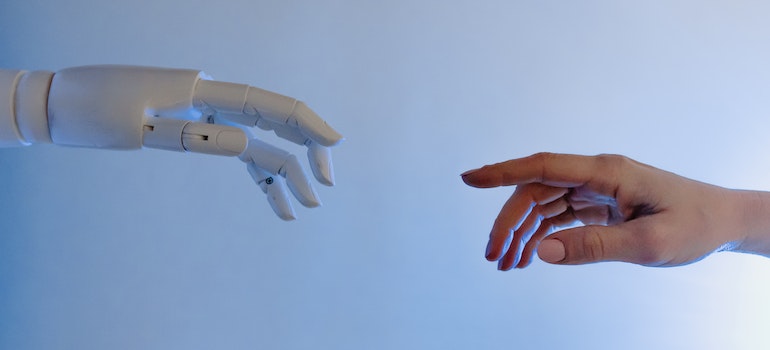 Person Reaching Out to a Robot.