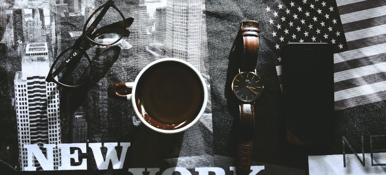 coffee and watch on the table