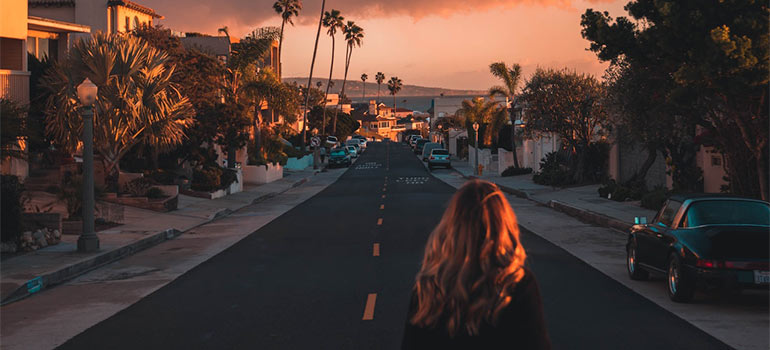 Girl walking and thinking about the reasons to move to California 